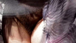 Hairy mature in transparent dress