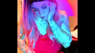 Trans girl Emma Ink gives a hot handjob wearing a red babydoll