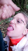 Skanky cumdump pig girl takes public facial in the woods